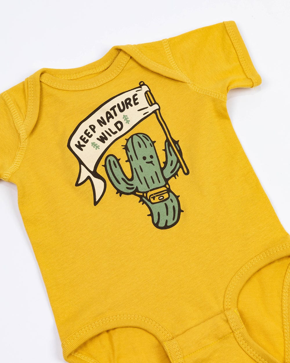 Keep Nature Wild Kids Happy Camper Saguaro Onesie | Mustard