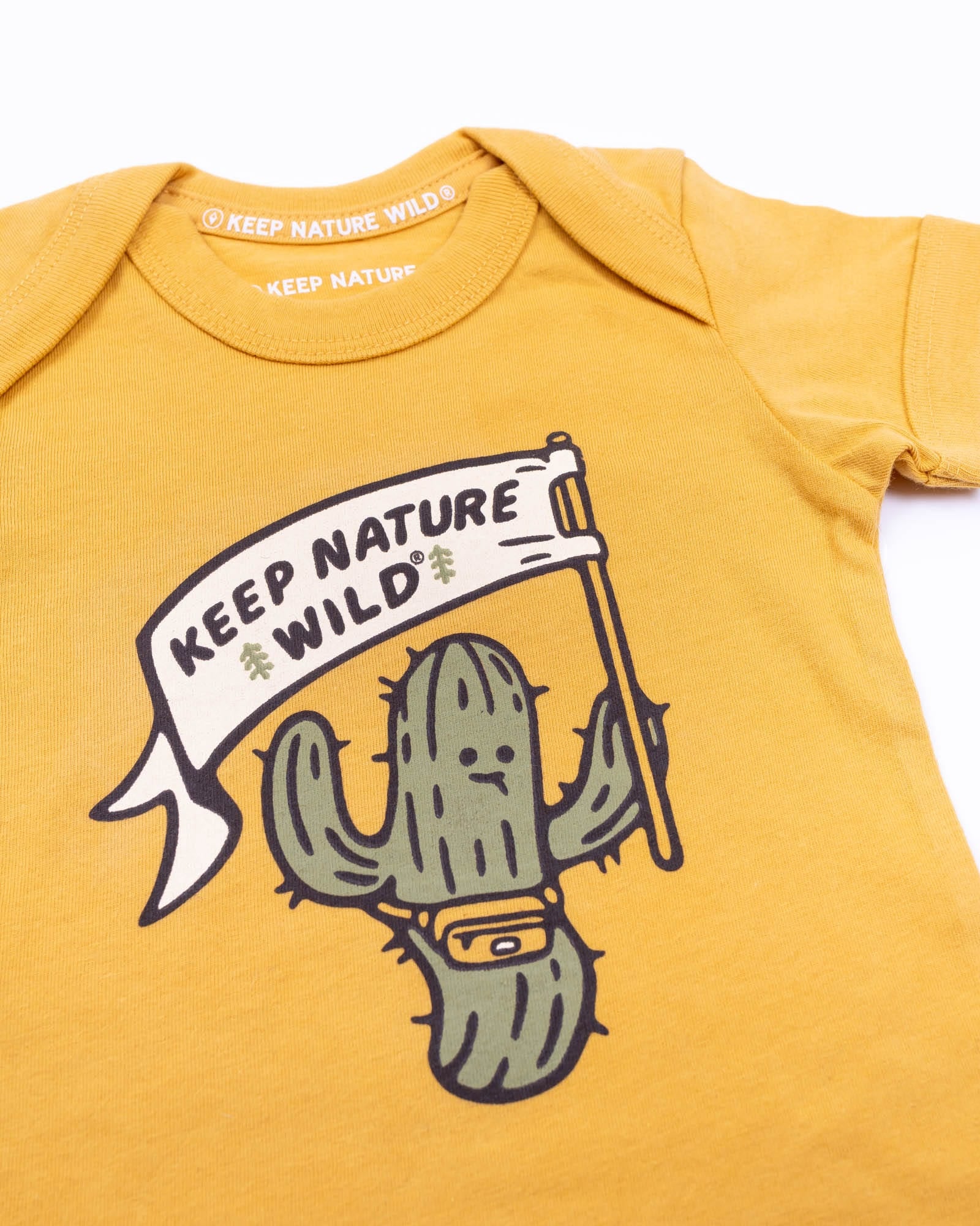 Keep Nature Wild Kids Happy Camper Saguaro Baby Bodysuit | Mustard