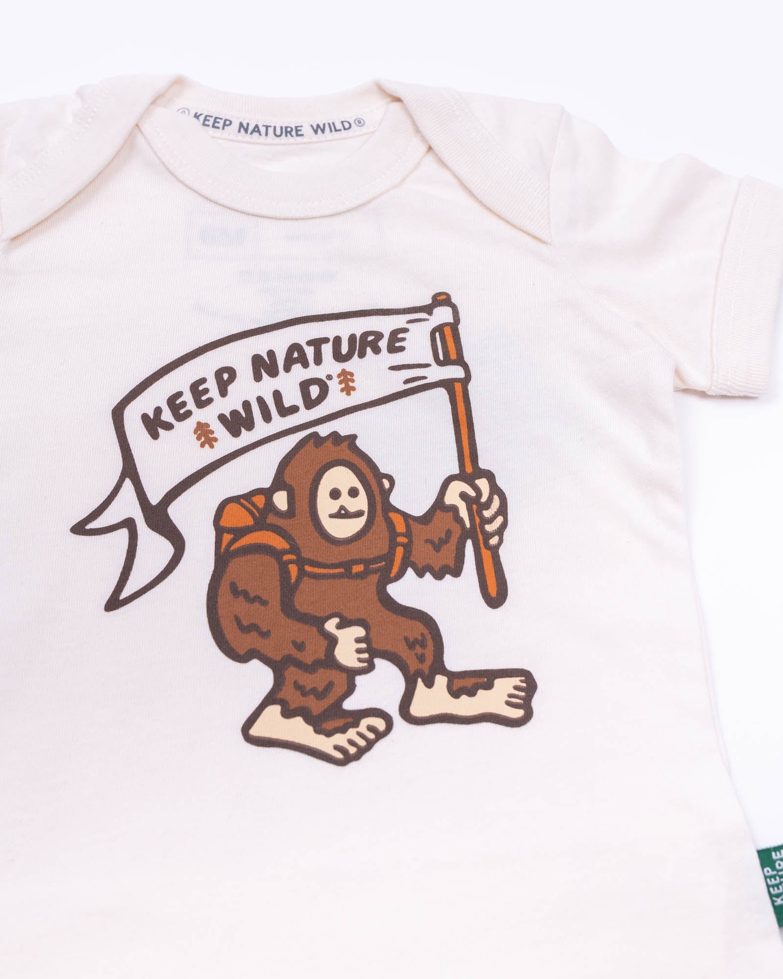 Keep Nature Wild Kids Happy Camper Squatch Baby Bodysuit | Heather Natural